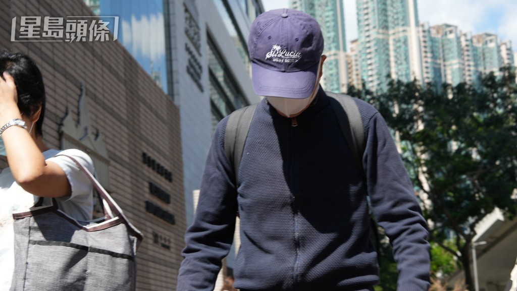 被告邱俊和今到庭應訊。吳艷玲攝 被告邱俊和今到庭應訊。吳艷玲攝