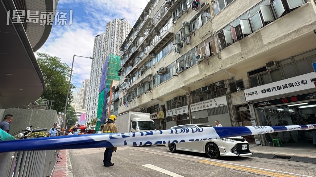大厦单位出现裂痕，对开路段需要封闭。刘汉权摄