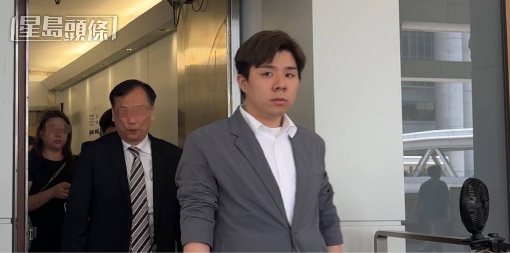 被告張浩錀(灰色外套)。 被告張浩錀(灰色外套)。