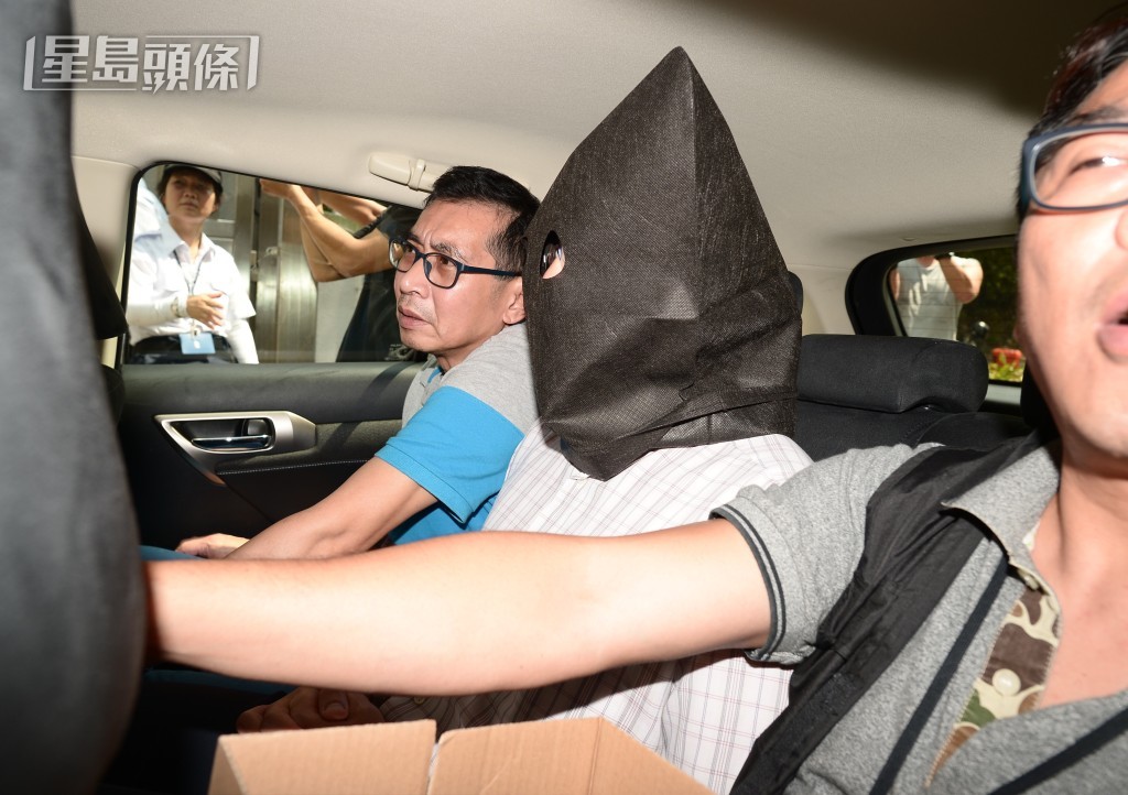 许金山被带走调查。资料图片 许金山被带走调查。资料图片