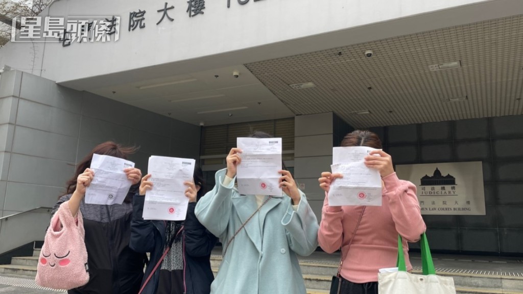 4名稱於小額錢債審裁處申索勝訴的苦主,今親到庭外堵截男被告追討欠債。廖凱霖攝 4名稱於小額錢債審裁處申索勝訴的苦主,今親到庭外堵截男被告追討欠債。廖凱霖攝