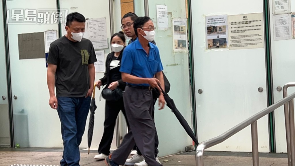 死者長子(左)等家屬到屍房認屍。蔡楚輝攝 死者長子(左)等家屬到屍房認屍。蔡楚輝攝