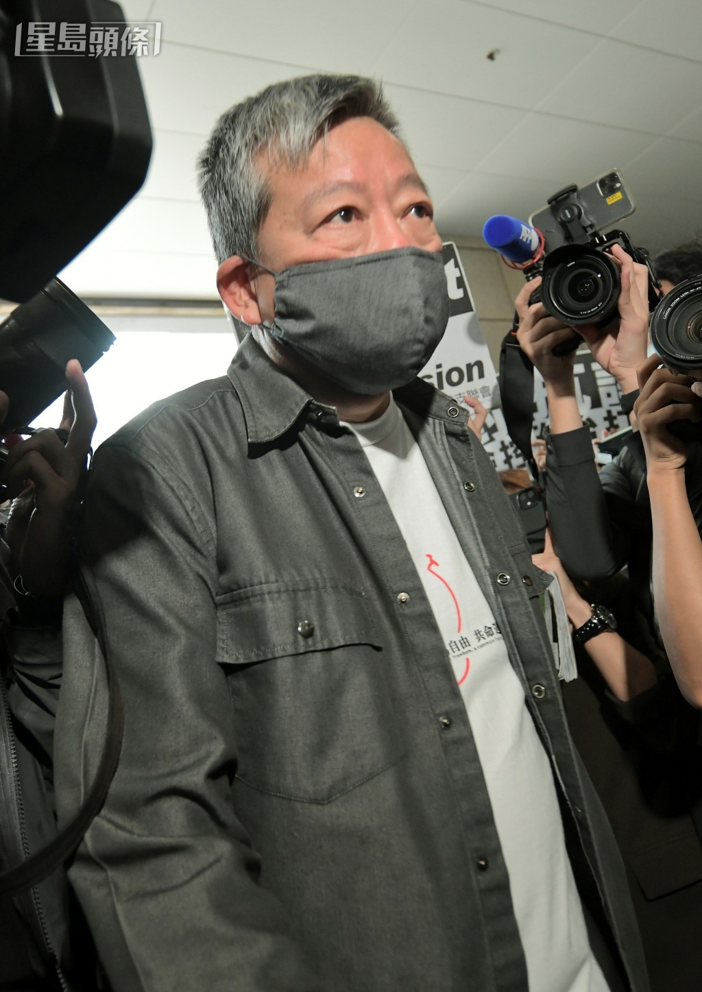 李卓人。资料图片