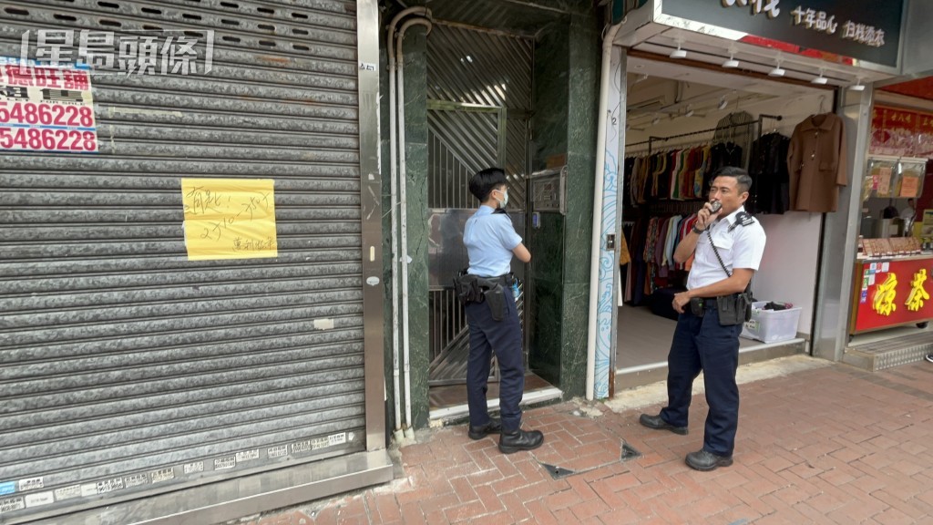 警員在大廈調查。