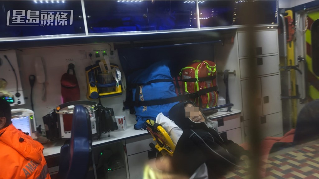 男事主受傷送院治理。黎志偉攝 男事主受傷送院治理。黎志偉攝