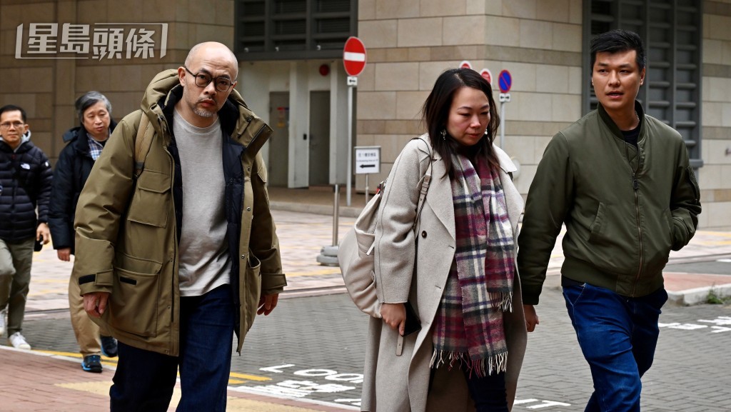 家屬不滿裁決中內容，當場拍枱離席。劉駿軒攝