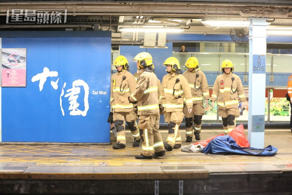 男子在大圍站金鐘方向月台跳軌,當場死亡。黎志偉攝 男子在大圍站金鐘方向月台跳軌,當場死亡。黎志偉攝