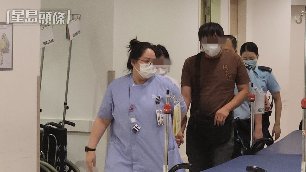 女嬰家人在醫院了解事件。黎志偉攝 女嬰家人在醫院了解事件。黎志偉攝