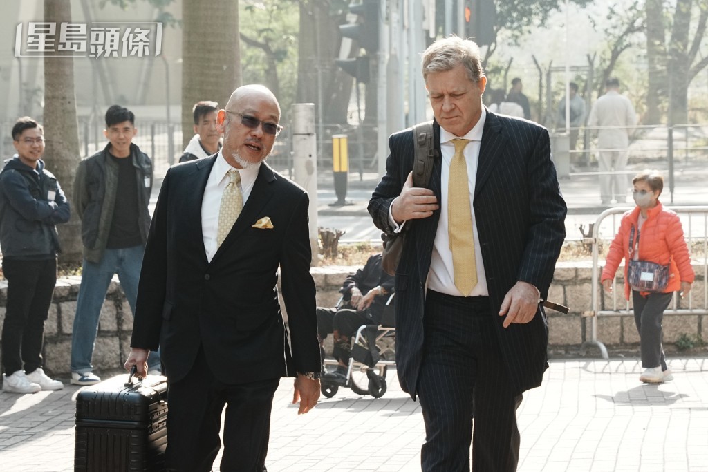 代表黎智英的資深大律師彭耀鴻與新西蘭御用大律師 Marc Corlett 。汪旭峰攝 代表黎智英的資深大律師彭耀鴻與新西蘭御用大律師 Marc Corlett 。汪旭峰攝