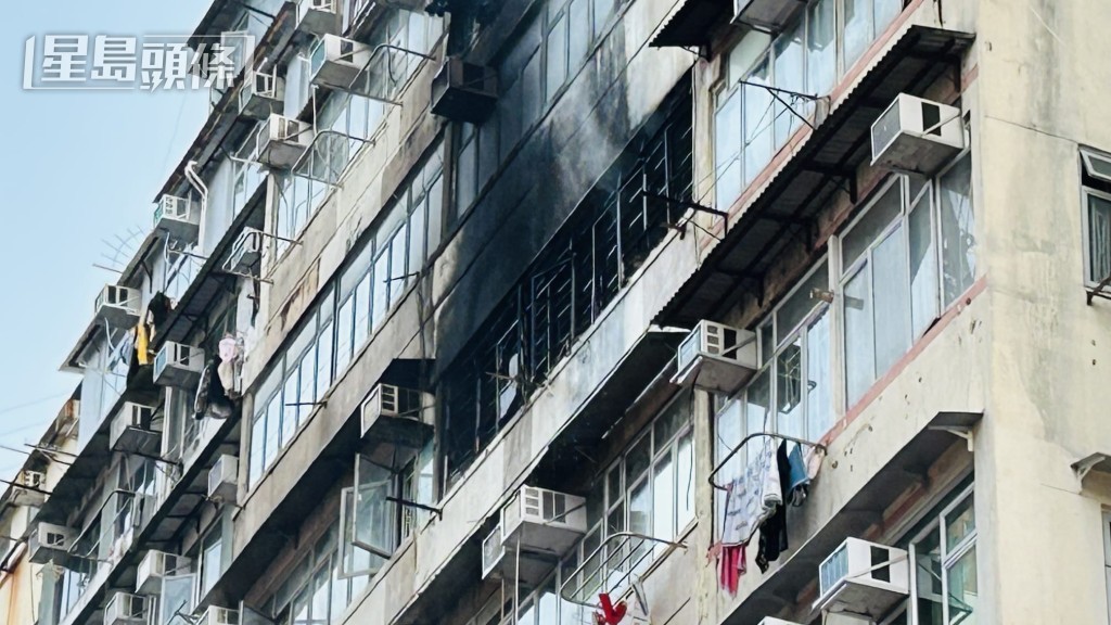 涉事單位外牆被濃煙熏黑。蔡楚輝攝 涉事單位外牆被濃煙熏黑。蔡楚輝攝