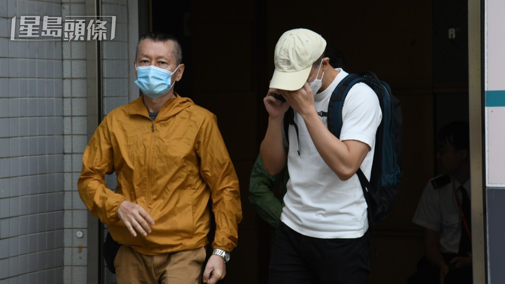 代表譚永東（戴帽者）的律師指，被告確有跟事主接吻但沒有「伸脷」。何健勇攝