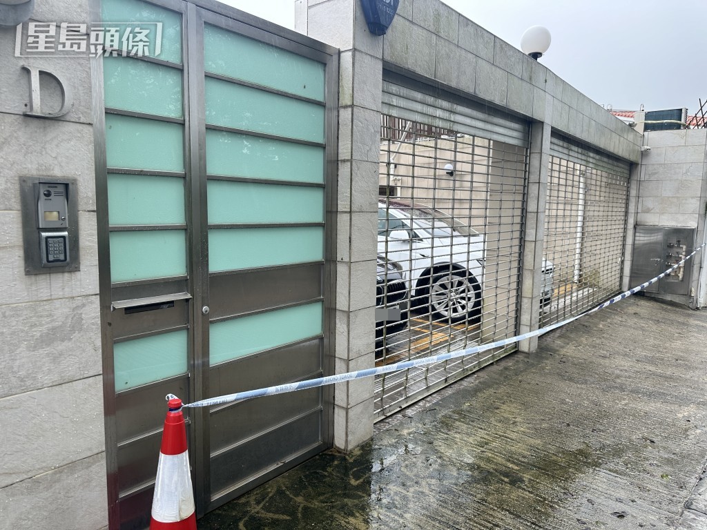 警方在大屋拉起封锁线。梁国峰摄