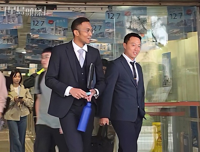 被告左起霍斌仁和屠俊翹。王仁昌攝