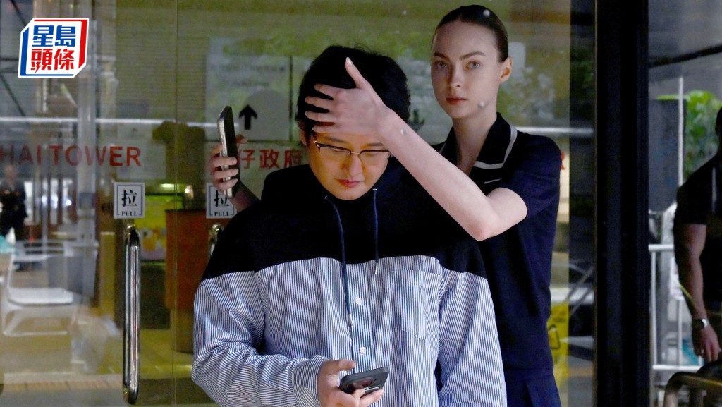 謝堯中（左）被指為案中主腦。劉駿軒攝