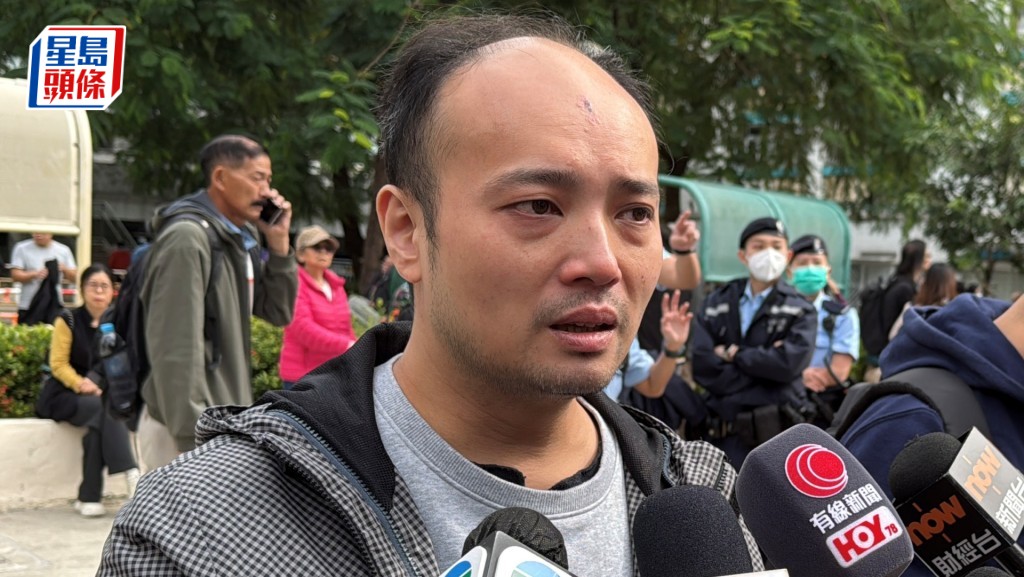 鍾先生表示，太太與愛貓至今仍未能救出。