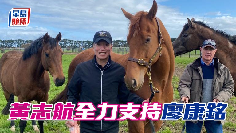 黃志航(中)與太太朱淑清全力支持廖康銘。