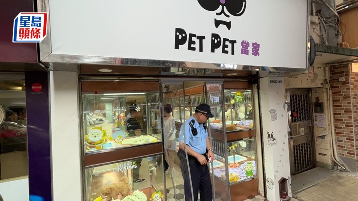 寵物店被偷狗，警員在場調查。蔡楚輝攝