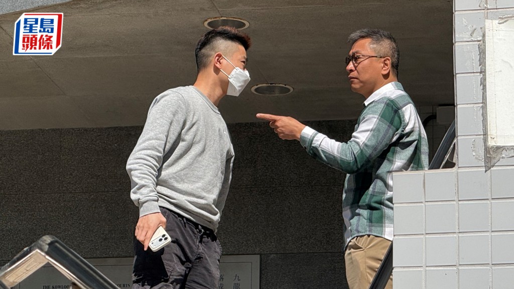 潘焯鴻散庭後與旁聽人士起爭執，「手指指」針鋒相對。黃巧兒攝