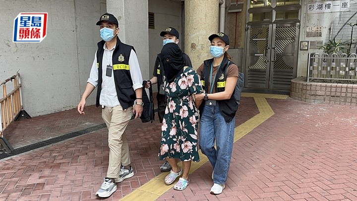 涉案人士被帶走調查。梁國峰攝