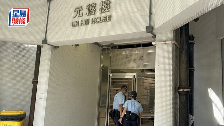元禧樓男子上吊，警員到場調查。梁國峰攝