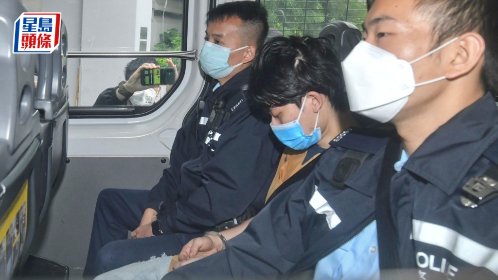 被告吳家聲（低頭藍口罩）。資料圖片