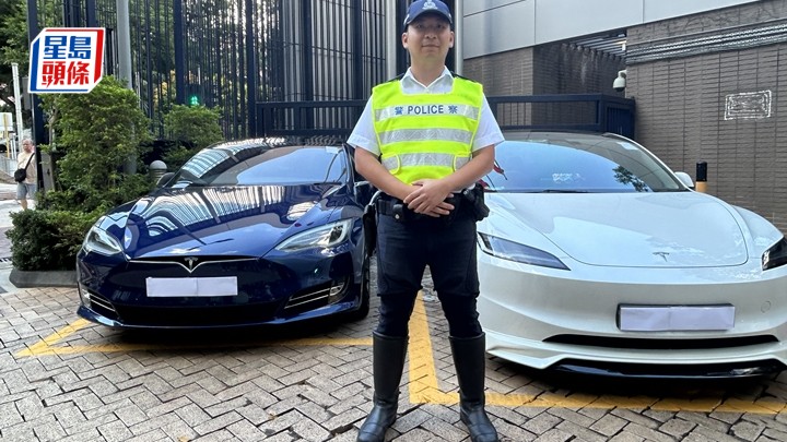 警方新界南總區交通部人員在葵青區打擊「白牌車」,截獲兩輛Tesla。林思明攝