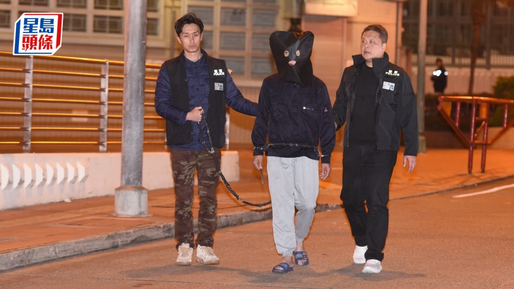 被告之一謝仲禮案發後被捕受查。資料圖片