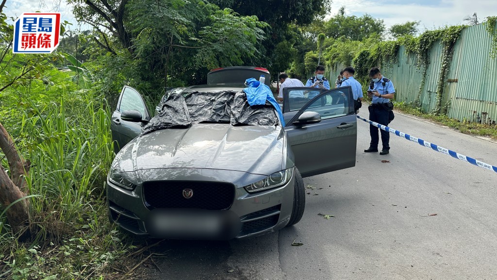 男子車內燒炭亡。林思明攝