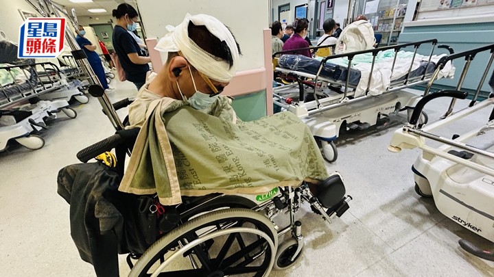 男工頭破血流獲送院治理。蔡楚輝攝