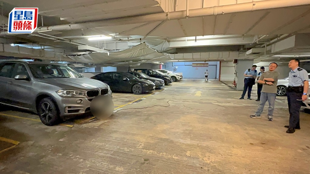 寶馬私家車右車門有鏽水迹，一度懷疑是被淋潑腐蝕性液體。梁國峰攝