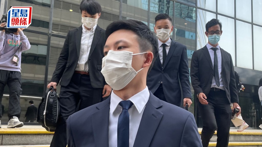 被告莫志成（图最前者）。资料图片