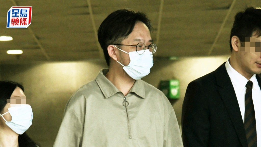 被告胡桁誌(中)被控3項串謀索賄罪及5項受賄罪。資料圖片