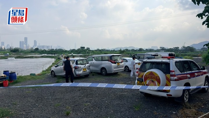 警方封鎖魚塘範圍調查。梁國峰攝