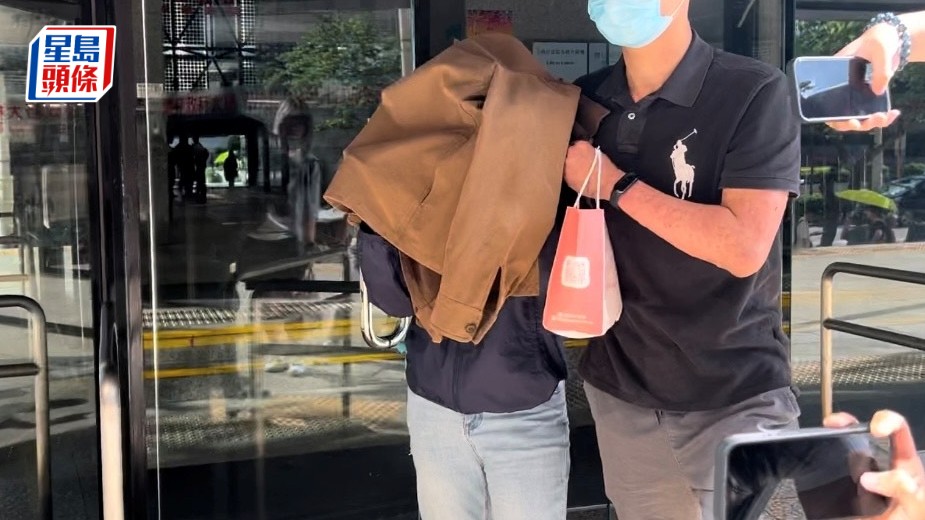 梁曉彤(蒙頭者)兩虐兒罪成提上訴被駁回,維持原判。資料圖片