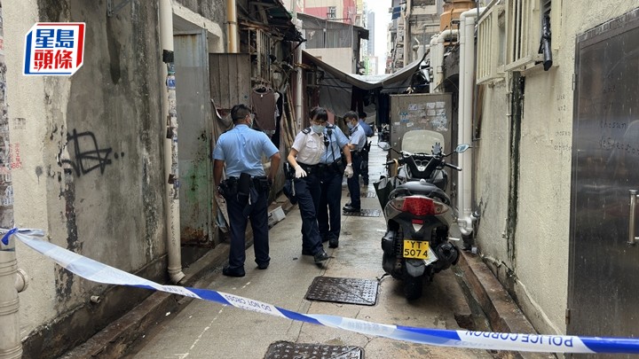 警方封鎖後巷調查。梁國峰攝