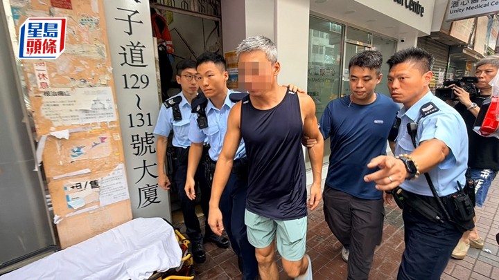 租客被捕帶署調查。梁國峰攝
