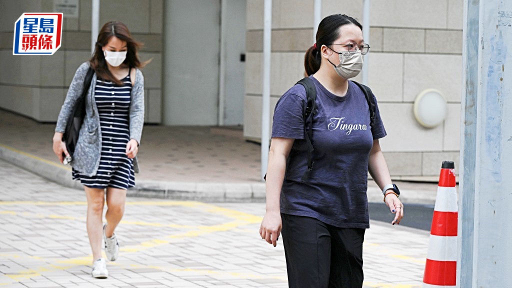 死者兩名女兒,前為幼女陳寶華。蘇正謙攝