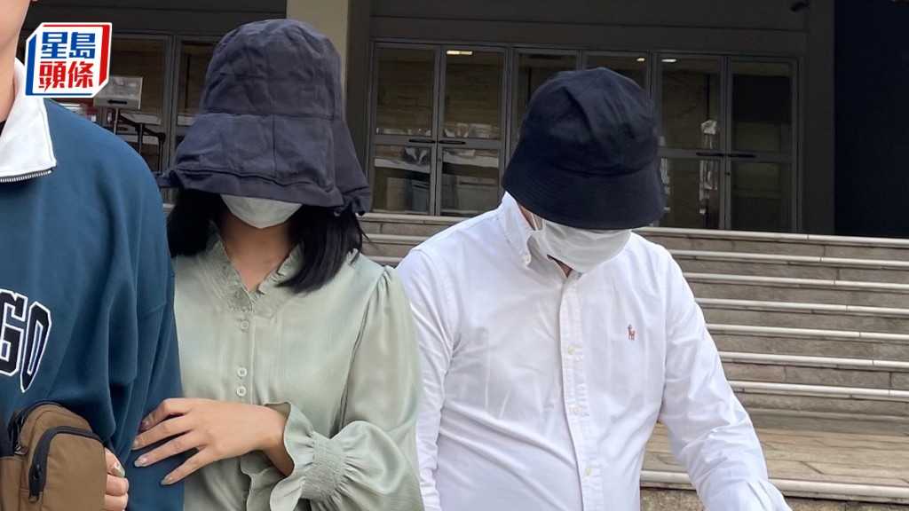 郭靜璇（女）及丈夫楊淦彪（右）獲裁定串謀詐騙罪不成立。廖凱霖攝