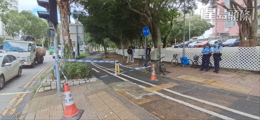 警方在行人路與單車徑拉起封鎖線。林思明攝 警方在行人路與單車徑拉起封鎖線。林思明攝
