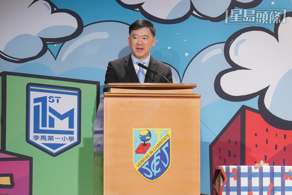 政制及內地事務局副局長胡健民致辭。