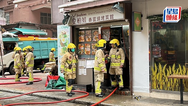 泰國菜館廚房抽油煙機起火。林思明攝