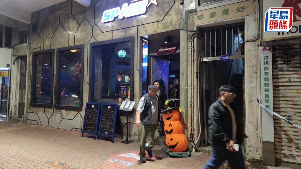 荃灣酒吧男子疑遭2至3人持刀襲擊 頭手受傷清醒送院 。黎志偉攝