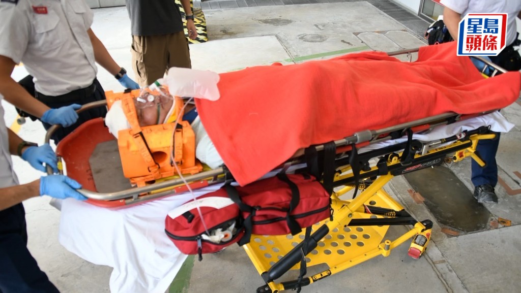 男傷者昏迷送院救治。楊偉亨攝