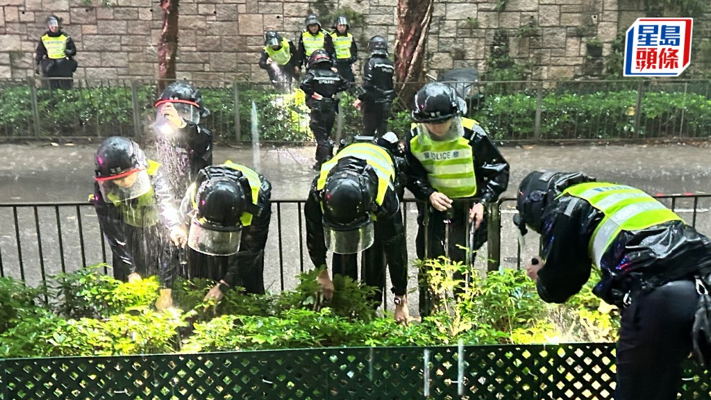 警員搜索失去的頭顱。蔡楚輝攝