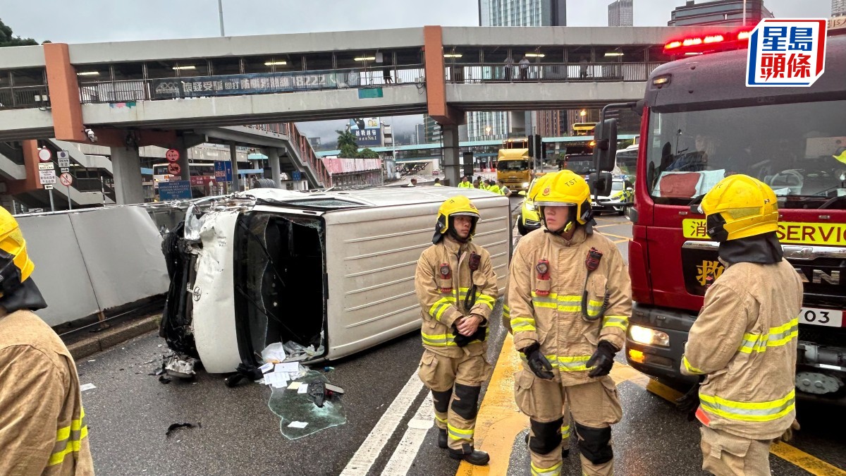 紅隧口客貨車失控撞欄翻側 男司機手腳擦傷送院