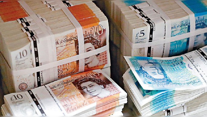 ■英國公佈大規模減稅計劃,拖累英鎊匯價單日大跌超過3%。 資料圖片