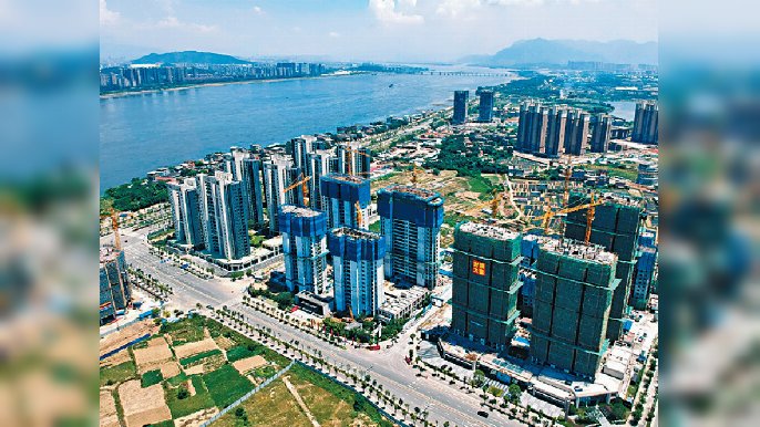 ■內地在部份地區展開房地產稅改革試點工作，徵稅對象包括居住用、非居住用等各類物業。資料圖片
